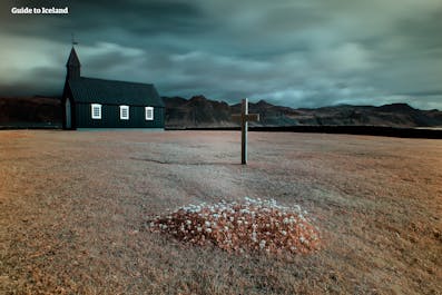 Travel around the Snæfellsnes Peninsula and visit the hamlet Búðir's iconic black houses.