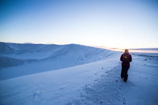 Traverse the crater rim and experience the symphony of colors at sunrise.