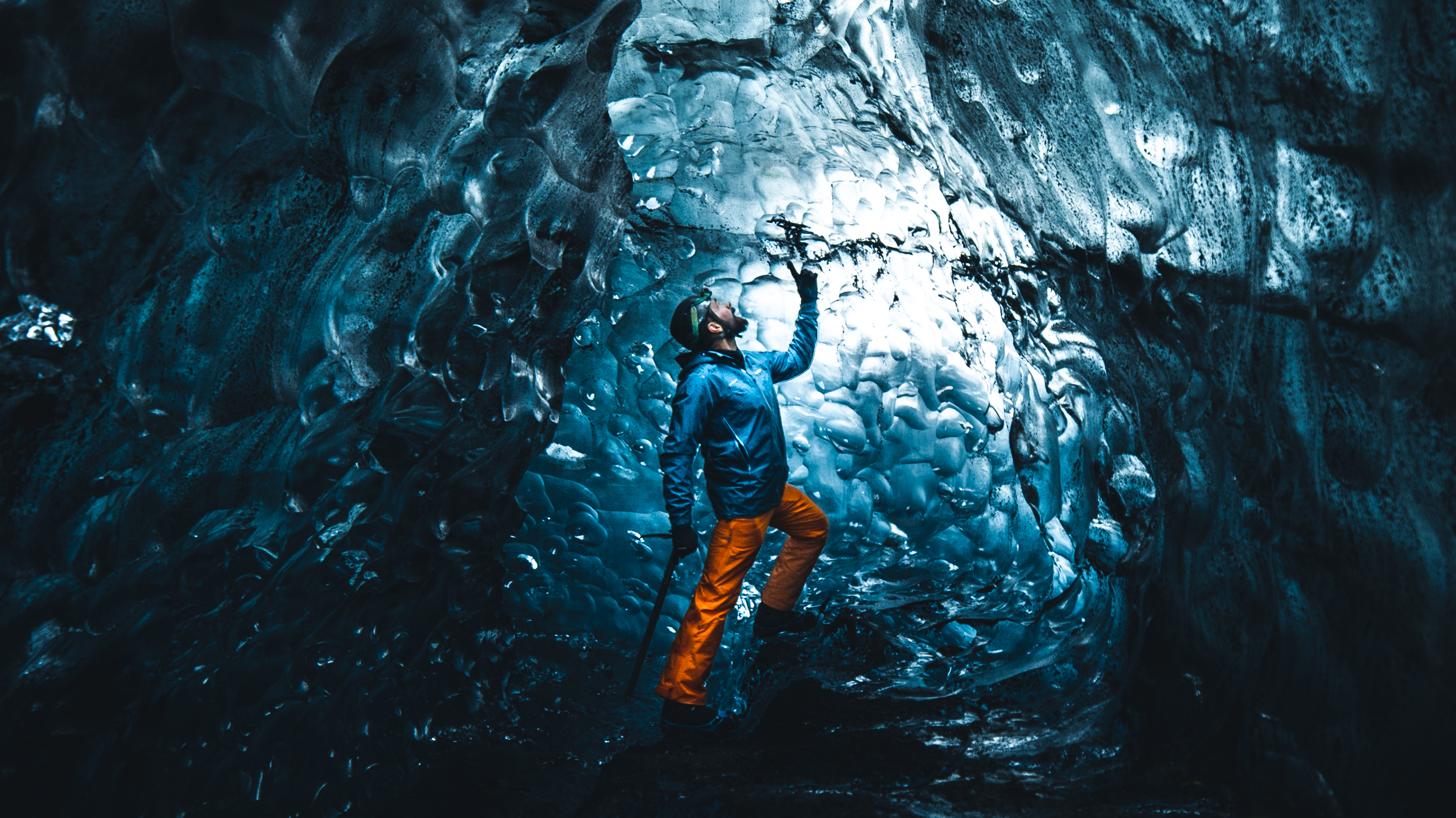 Natural glacier ice caves in Iceland have incredible blue colour inside.