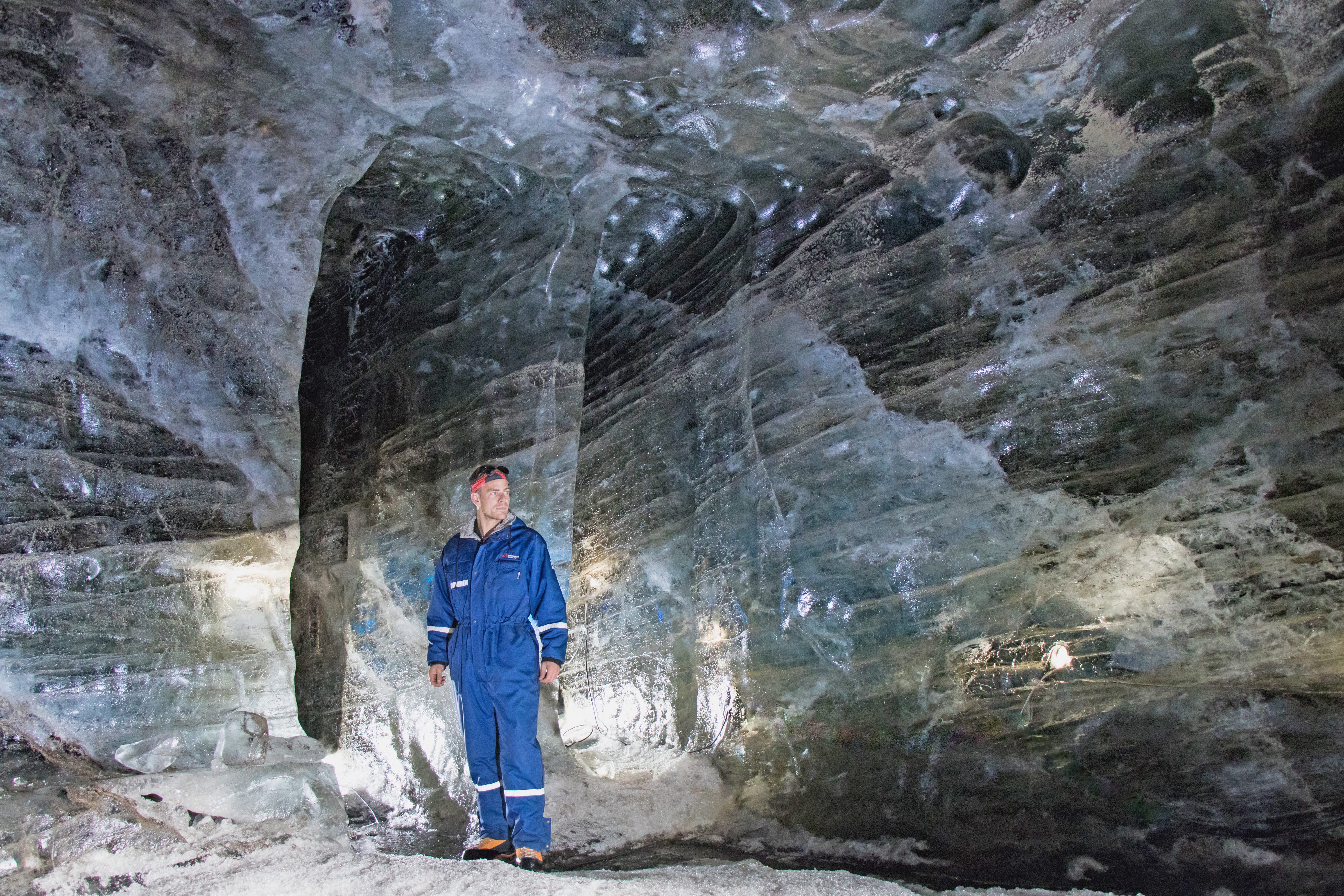 A man standing in Langjökull Ice Cave