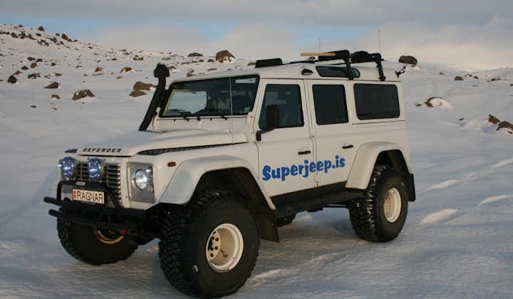 Experience the magic of snow-covered vistas from the comfort of a Superjeep.