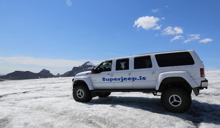 A super jeep parked on the snow during a tour of Iceland's Golden Circle in winter.