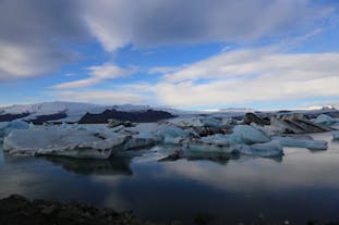 Jokulsarlon glacier lagoon features floating icebergs of different sizes.