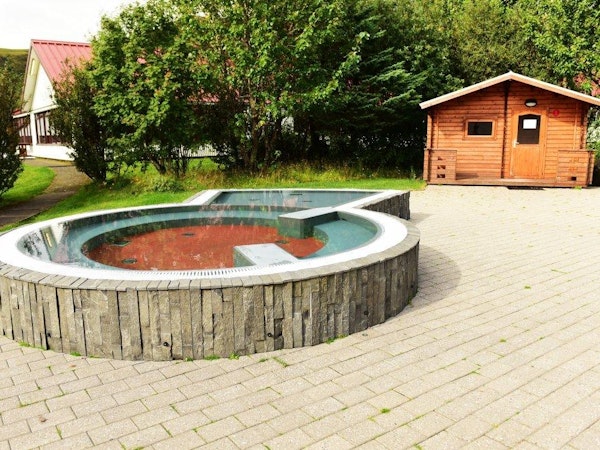 Guests can relax at Hotel Katla's outdoor tub.