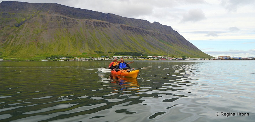 Regína Kayaking by Ísafjörður town in the Westfjords of Iceland