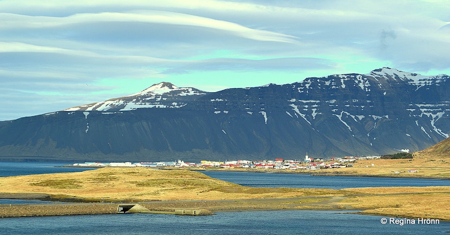 Grundarfjörður in the distance as seen from Kirkjufellsfoss waterfall. 