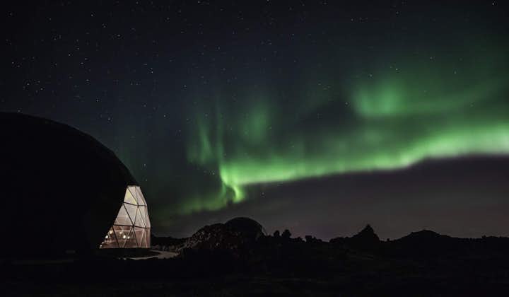 The Aurora Observatory with the Northern Lights in the sky