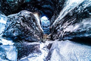 The black stripes visible in the ice caves are layers of ash from the previous eruptions by the Katla volcano.