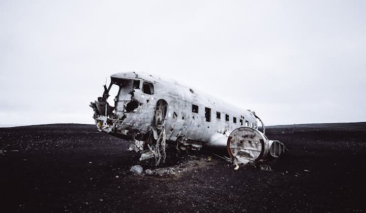 The DC-3 plane wreck in Solheimasandur is an excellent location for photography of the contrasting aircraft ruins against the beach’s black sand.