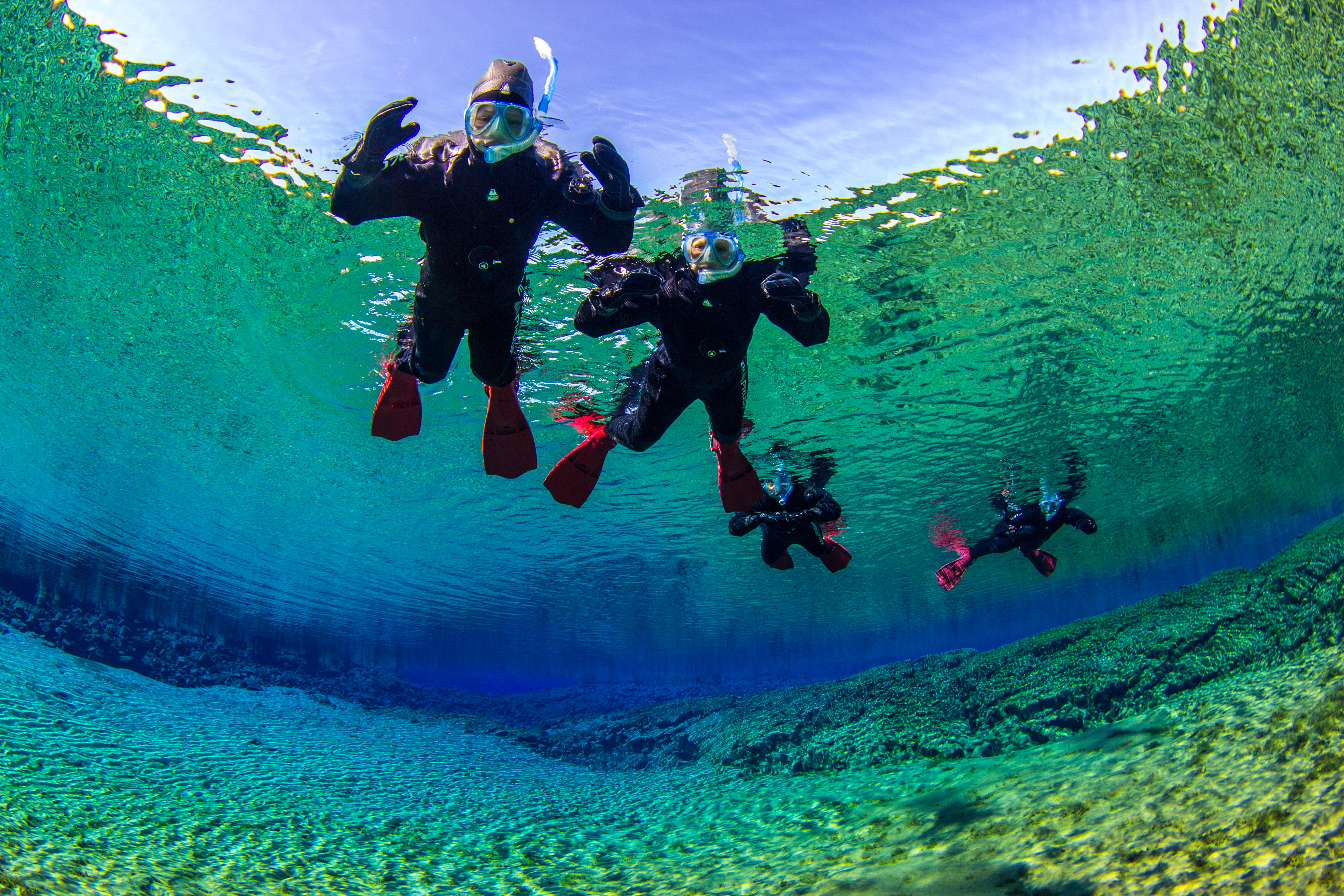 Two people snorkelling in Silfra