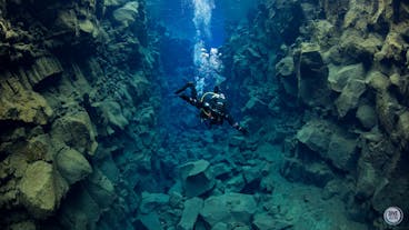 The Silfra fissure is stunning with its vibrant hues of blue and turquoise and magnificent rocky underwater terrain.