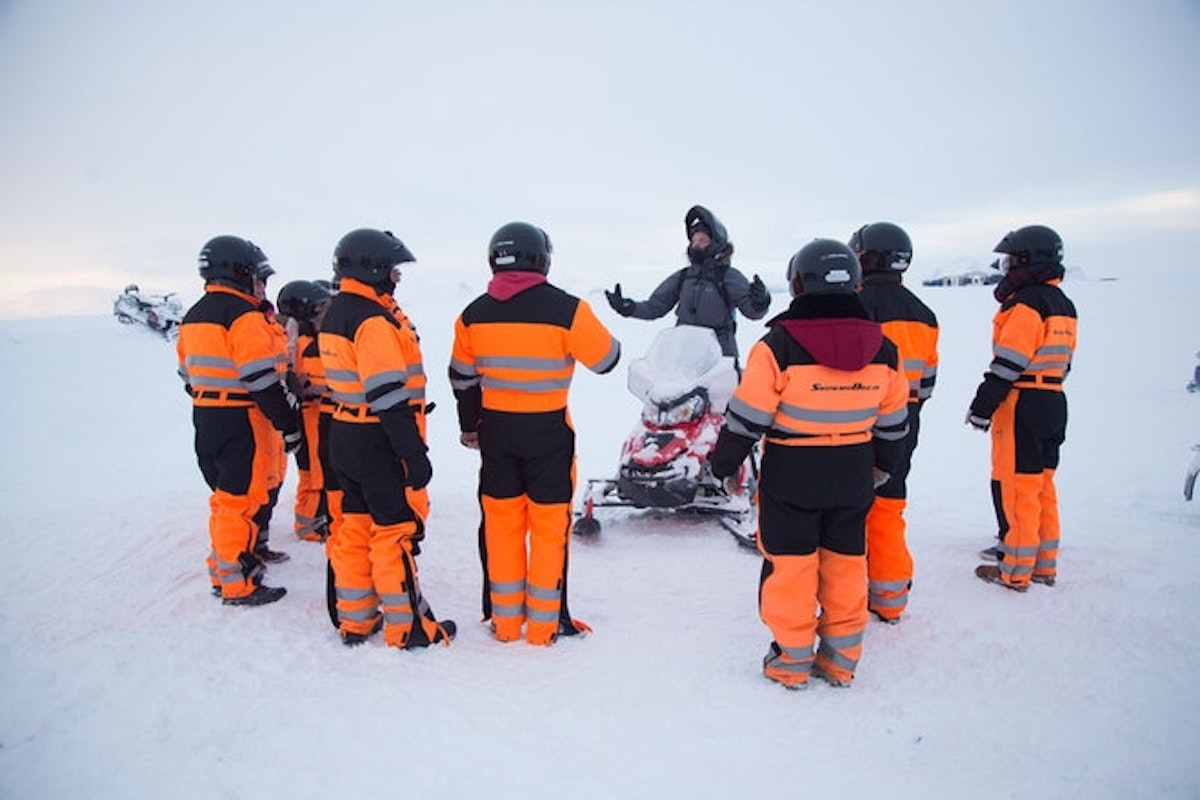 Small-Group 9-Hour Ice Caving and Snowmobiling Tour in Langjokull from ...