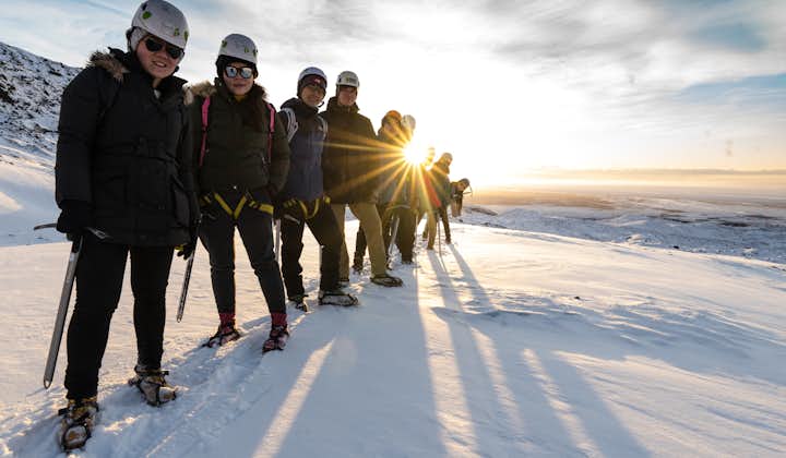 A group of people geared up for a glacier hike in Iceland