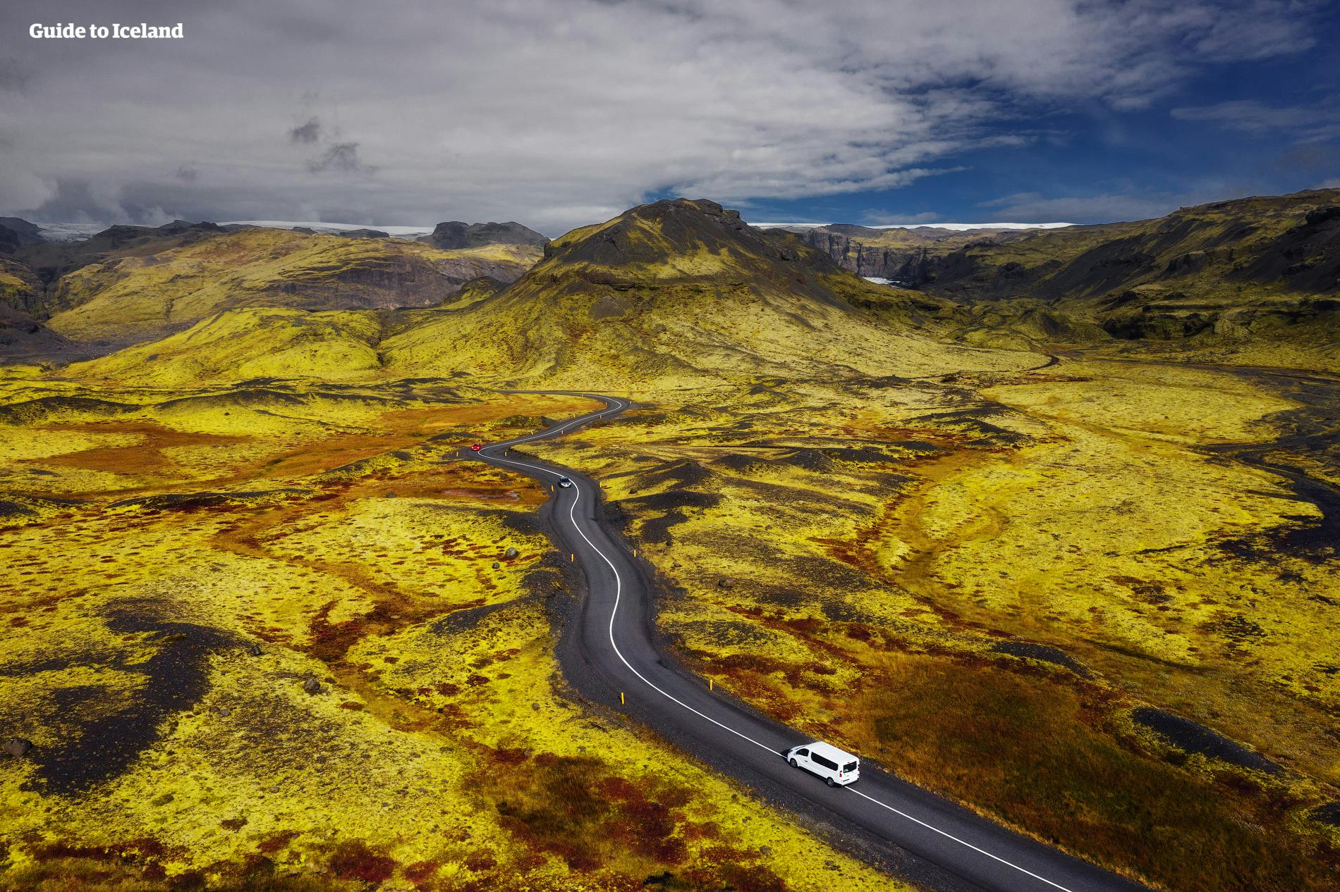 An overhead shot of a road travelling through the South Coast of Iceland.