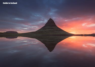 Kirkjufell Mountain on the Snaefellsnes Peninsula of Iceland pictured at sunset in summer.