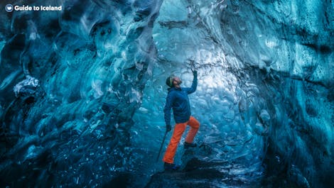 A visitor inside an ice cave in the Southeast of Iceland.