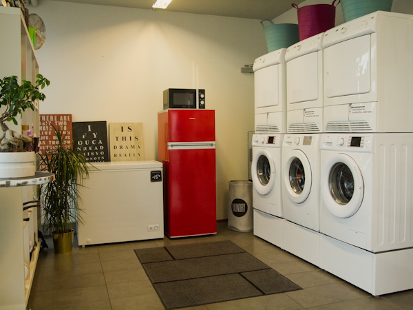 Kopavogur's Blue Mountain Apartments have a communal laundry room.