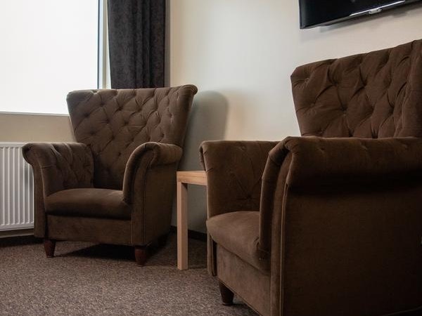 Hotel Dyrholaey has comfy seating areas in its larger rooms.
