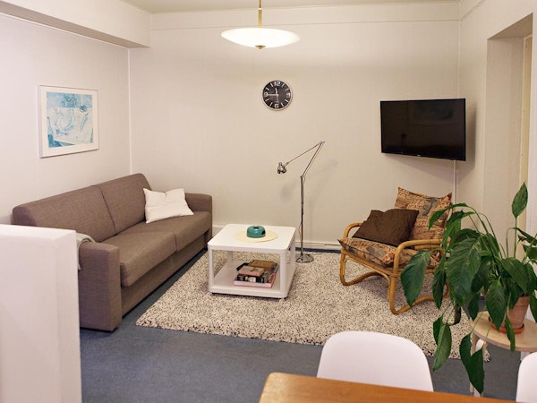 The Brattagata Guesthouse has a cosy living area for families or friends to socialise.