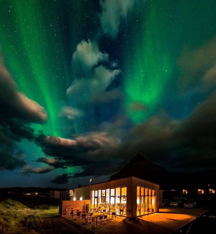 Arnarstapi Hotel, under the northern lights of Iceland. 