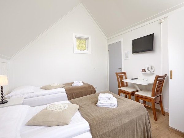 A spacious room in the Vik Cottages.