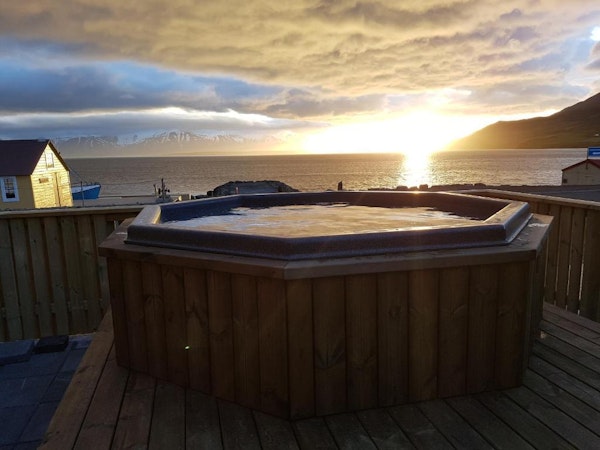 Grenivik Guesthouse has a hot tub overlooking Eyjafjordur in North Iceland.