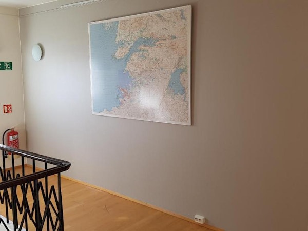 Akranes HI Hostel has a map on the wall.