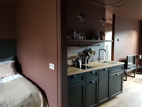 The Inni Boutique Apartments have fully furnished kitchens.