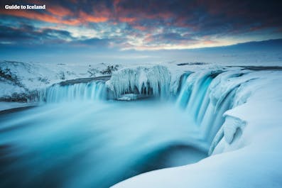 Many of Iceland's waterfalls become vivid shades of blue in midwinter.
