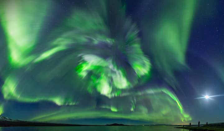 The northern lights dancing in the sky in Iceland in winter.
