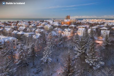 Reykjavik covered in snow becomes a festive wonderland.