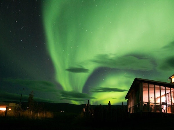 Husey Hostel & Horse Farm, as seen under the Northern Lights.