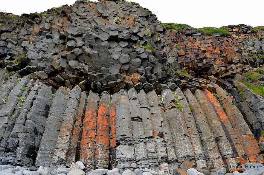 Basalt columns rise at Kálfshamarsvík beach.