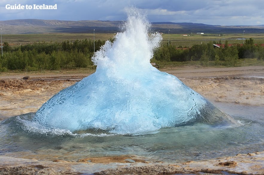 Strokkur prepares to erupt on the Golden Circle in Iceland.