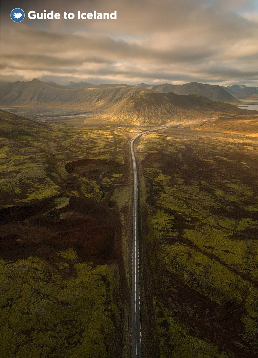 Iceland's Ring Road surrounded by mountainous landscapes