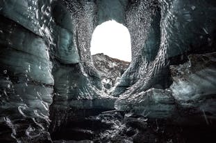 Katla's ice cave is layered with volcanic ash.