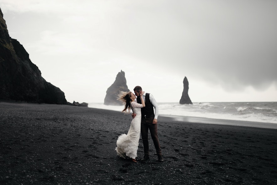 A couple get married on Reynisfjara beach.