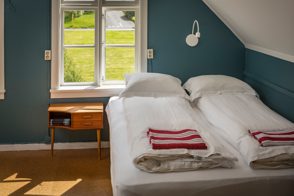 Hafaldan HI Hostel | Old Hospital's beds are cosy and welcoming.