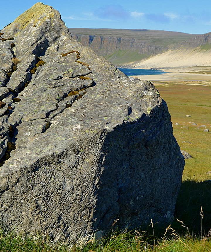 Regína by Strýtusteinn rock, the dwellings of the hidden people of Iceland