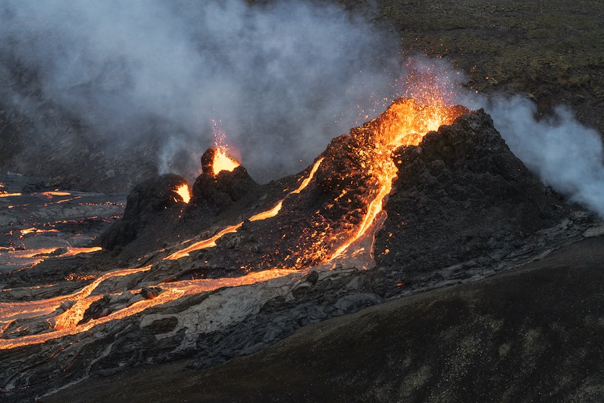 Lava sputters from a crater in a close-up image of Fagradalsfjall.