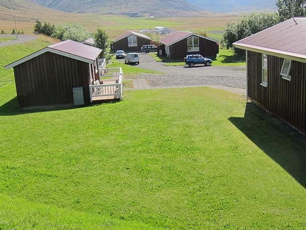 Kaffi Holar Apartments and Cottages are verdant in summer.
