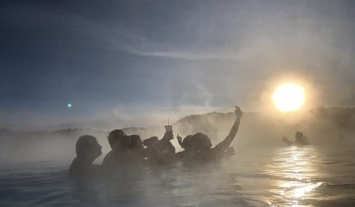 A group of bathers take a selfie as they enjoy the Blue Lagoon geothermal spa.