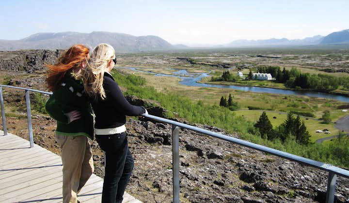 Two women take in the beauty of Thingvellir National Park, in southwestern Iceland.