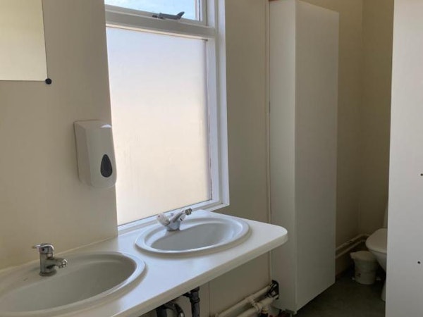 Hlíð Hostel has shared private bathrooms.