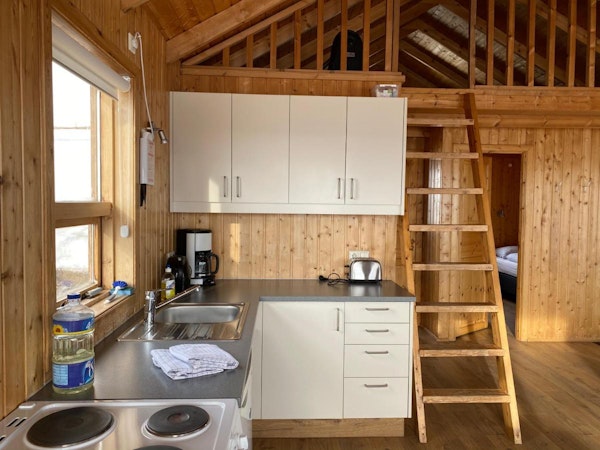 The Hlid Cottage has a lovely kitchen for families.