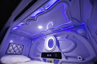 Galaxy Pod Hostel has cosy pods styled like a spaceship.