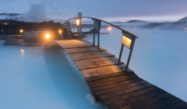 A pathway crosses the azure waters of the Blue Lagoon.
