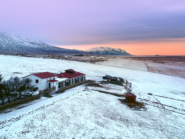Karuna Guesthouse is surrounded by stunning, snowy landscapes.
