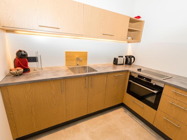 The Hrimland Apartments have private, fully-furnished kitchens.