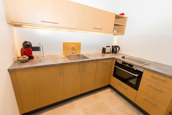 The Hrimland Apartments have private, fully-furnished kitchens.